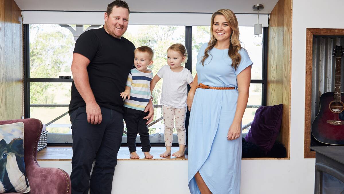 Toad Heffernan and Mandy Stone at home on the South Coast with their twins Lenny and Layla. Photo: Supplied
