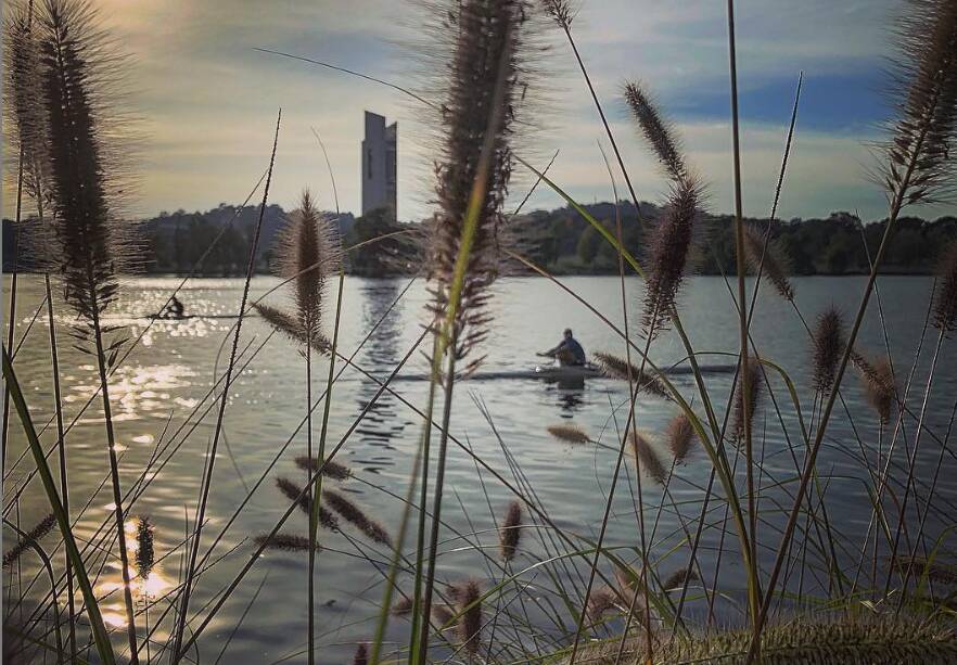 @karleenminney: Morning runner meets morning rower by Lake Burley Griffin.