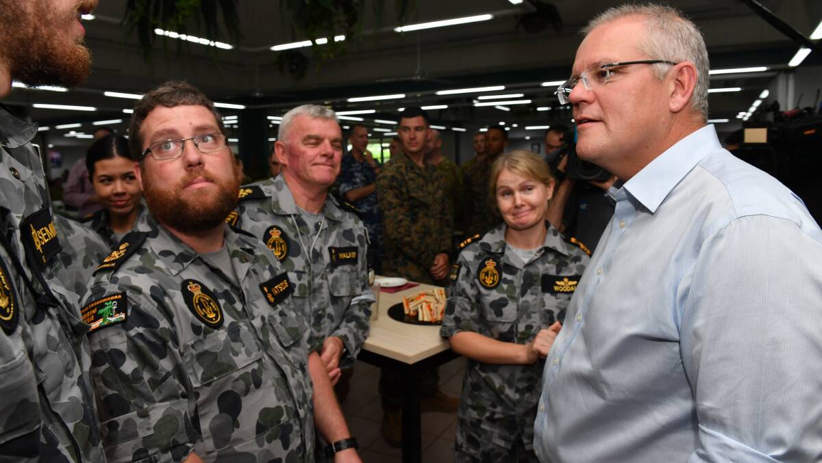 Prime Minister Scott Morrison meets with members of the Australian Defence Force at Robertson Barracks in Darwin. Photo: AAP