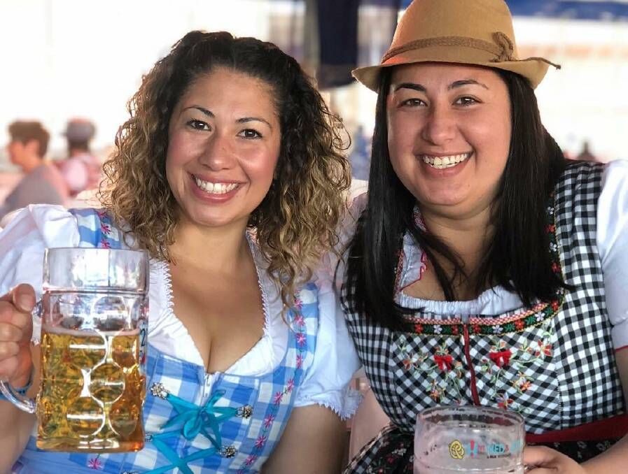 Queanbeyan sisters Kathrina and Clare Weinhonig were all smiles when Oktoberfest moved from EPIC to their local showground in 2017. Photo: Supplied