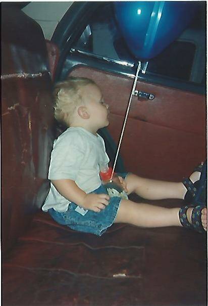 Nathan Hall, at aged two, asleep in the back of the family Morris Minor. Photo: Supplied