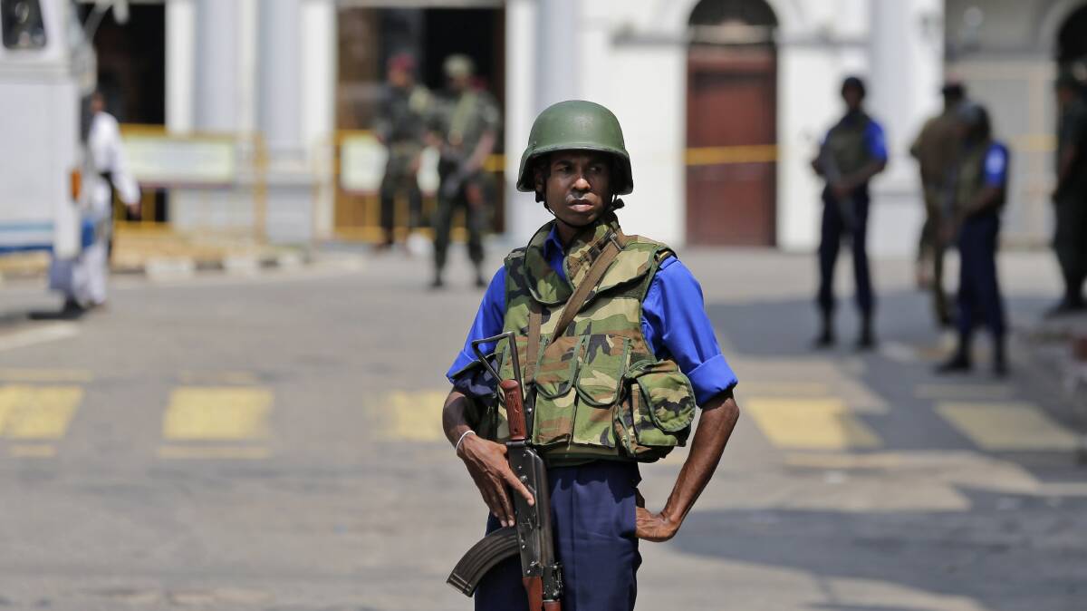 Sri Lankan navy soldiers keep guard outside St Anthony's Church in Colombo on Thursday after more suspicious items were found. Photo: AP