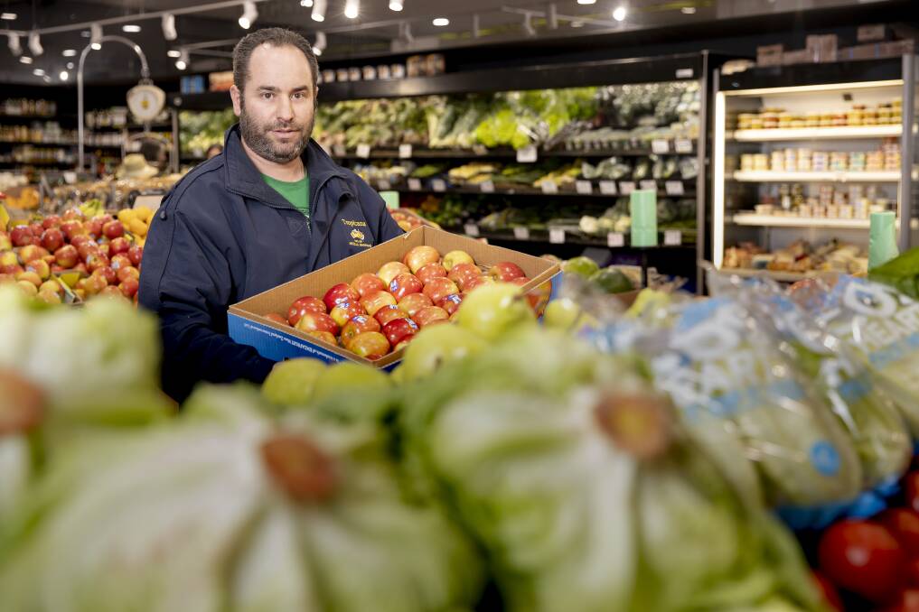 Kostas Stavraki is the owner of Freddy Frapples fruit and vegetables shop in Weston Creek. Picture: Sitthixay Ditthavong