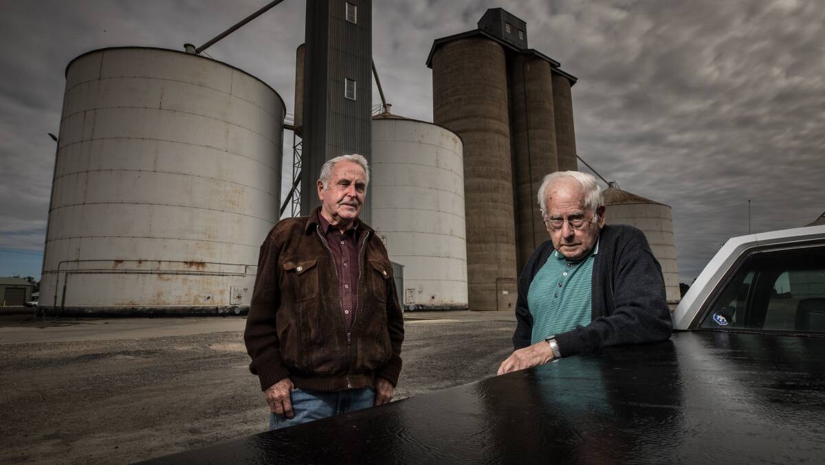 Lifetime grain and sheep farmers Ron Smith and George Allitt, in Jeparit. Photo: Jason South
