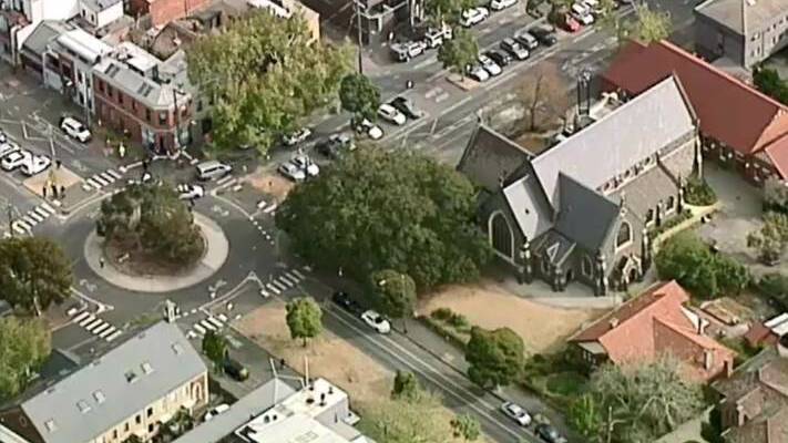 Police have arrested a man near St Mary's church in North Melbourne. Photo: Nine News
