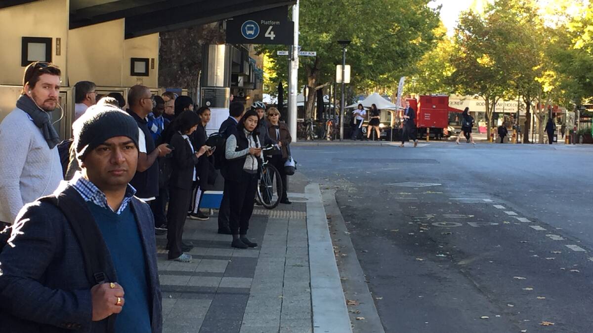 Commuters in Civic on the first day of the public transport network changes. Photo: Andrew Brown