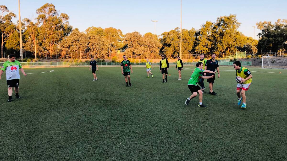 Canberra Raiders under-20s play a game of touch football at the inaugural Score Raiders session.