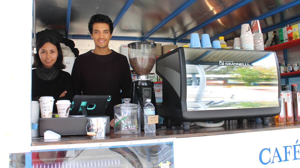 Nathalia and Diego Barragan fromCafe Bolivar are supplying the coffee for Scullin Traders. Picture: Tiffany Poke