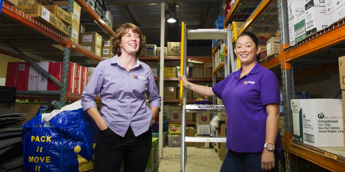 Operations manager of Canberra City Care Danielle Bate and manager of handUP food pantry and RE-runs op shop Kristen Castro. Picture: Dion Georgopoulos.