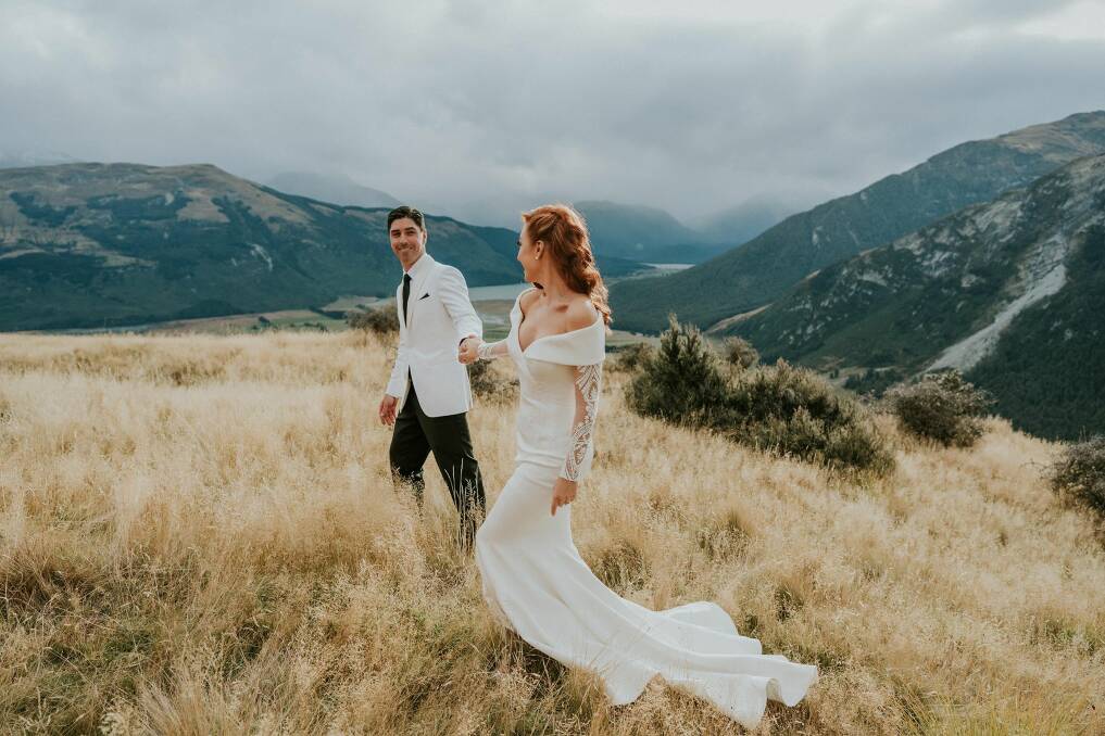 Iain Davidson and Kristen Henry on their wedding day in New Zealand last year.