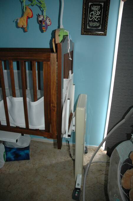 The cot for Francine Rowland-Mahmoud's baby also has a scissor-lift mechanism.