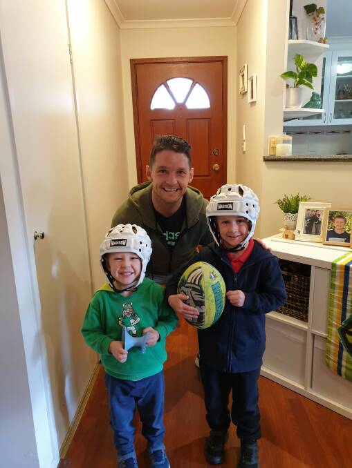 Canberra Raiders co-captain Jarrod Croker with Luca and Archie Breen after he dropped off a second headgear.
