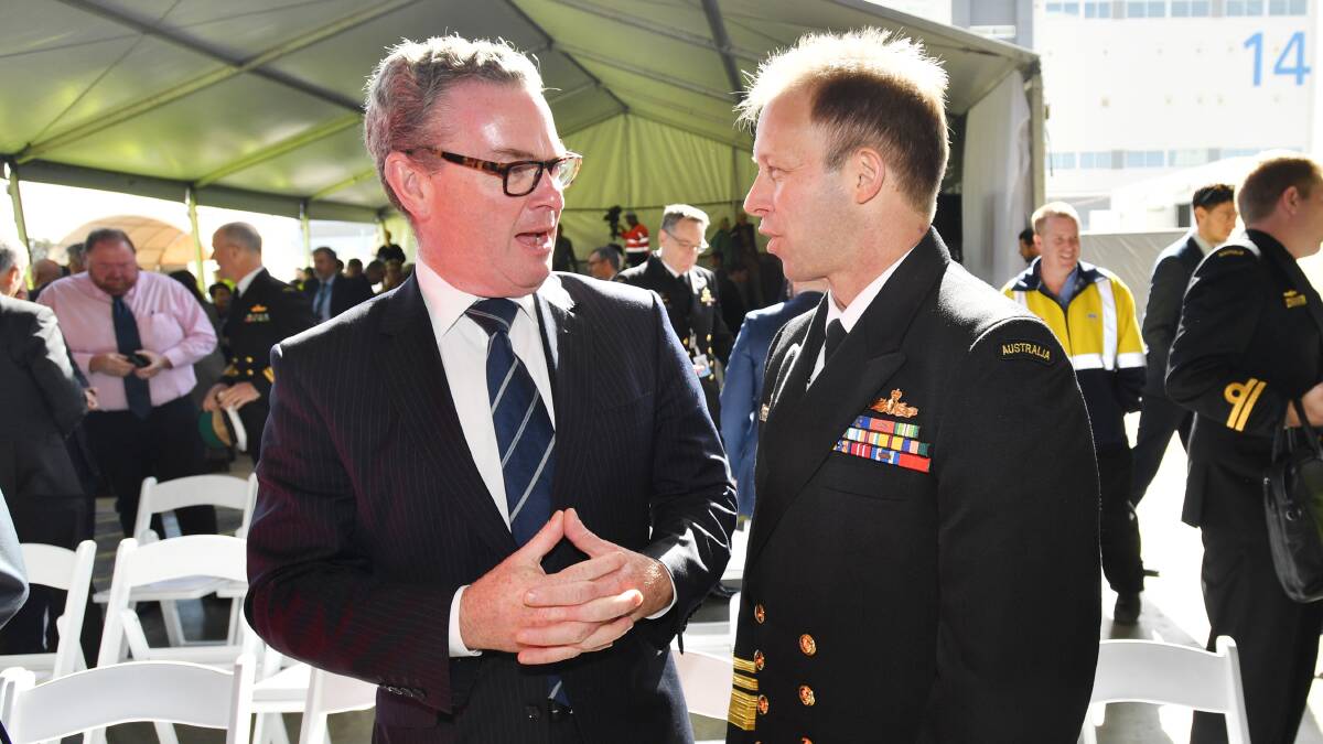 Minister for Defence Industry Christopher Pyne is seen with Vice Admiral Michael Joseph Noonan during the First Arafura class Patrol vessel keel-laying ceremony at the Osborne shipyards in Adelaide. Picture: AAP