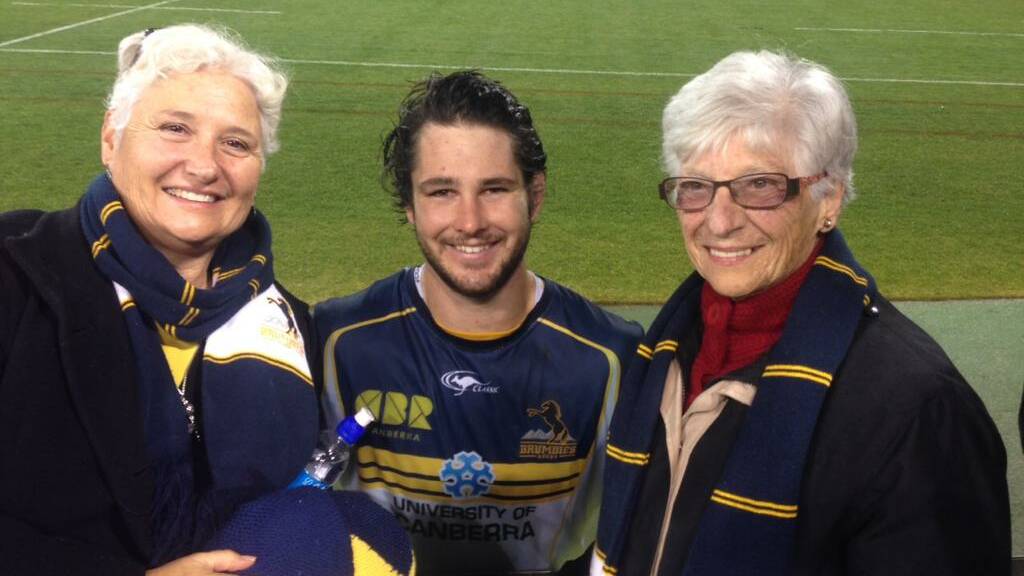 Sam Carter with his mum Susan and grandmother Ann after a Brumbies game in Canberra.