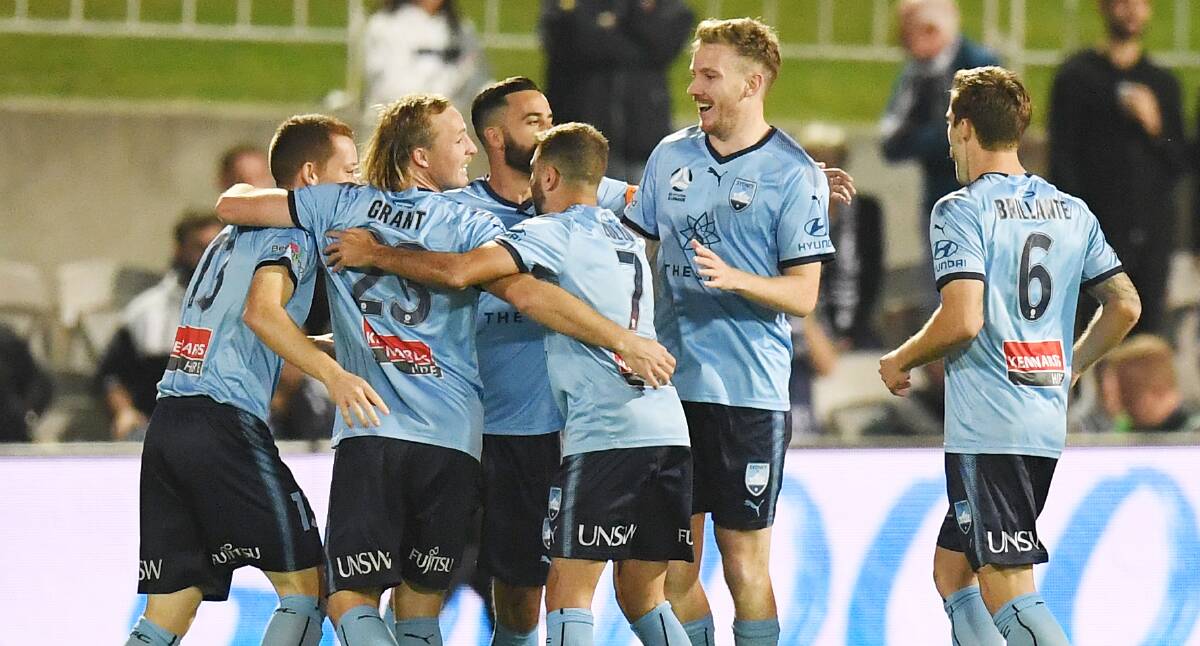 Sydney FC celebrate Rhyan Grant's goal in their drubbing of Melbourne Victory. Picture: AAP