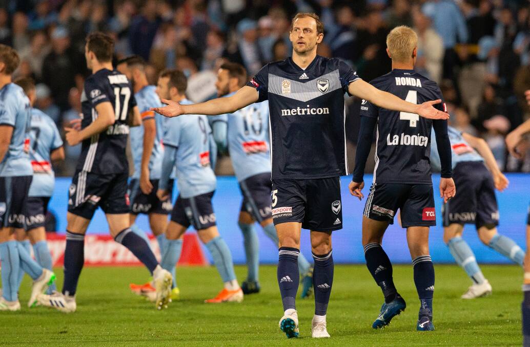 George Niedermeir of the Victory reacts to Sydney FC's first goal. Picture: AAP