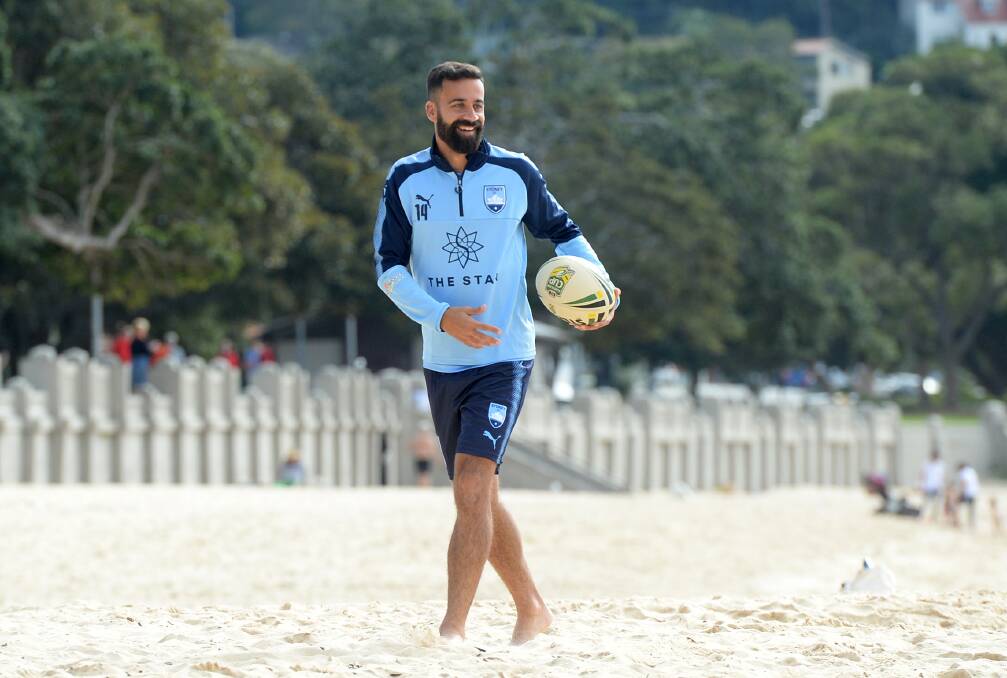 Sydney FC's Alex Brosque is seen during a recovery session at Balmoral Beach on Monday. Picture: AAP