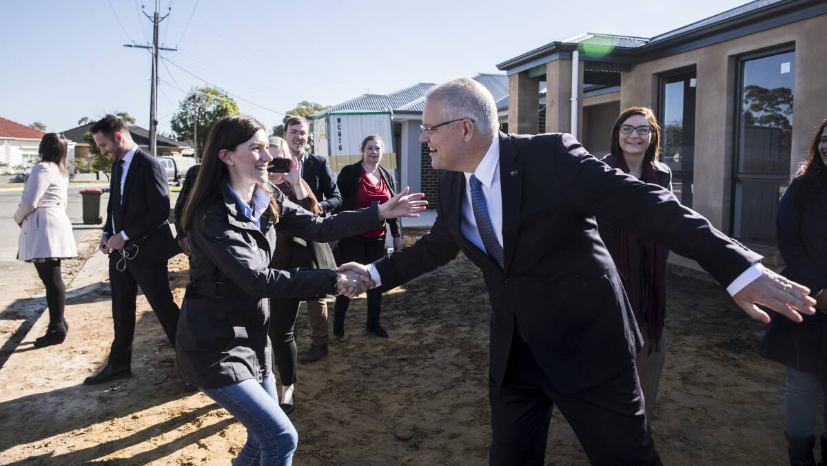 Scott Morrison and Nicolle Flint, the Liberal candidate for Boothby in Adelaide, visiting a hew housing estate to promote the Coalition's first home buyer plan. Picture: Dominic Lorrimer