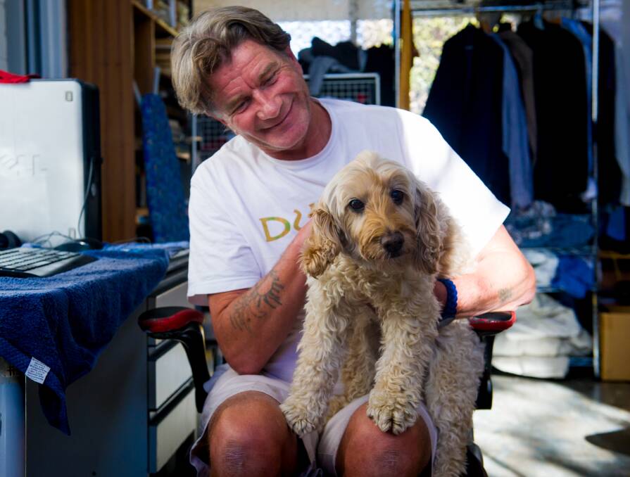 Bradley Gill with Samaritan House dog, Charli. Picture: Elesa Kurtz
