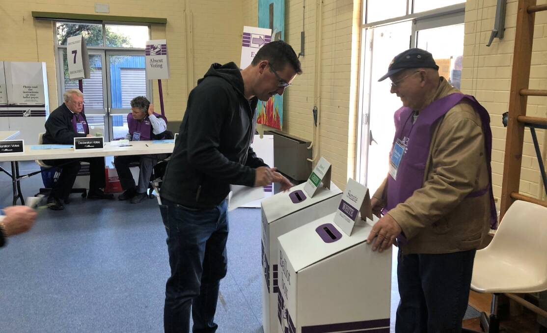 Liberal Senator Zed Seselja casting his vote at St Thomas the Apostle Primary School in Kambah. Picture: Kimberley Le Lievre