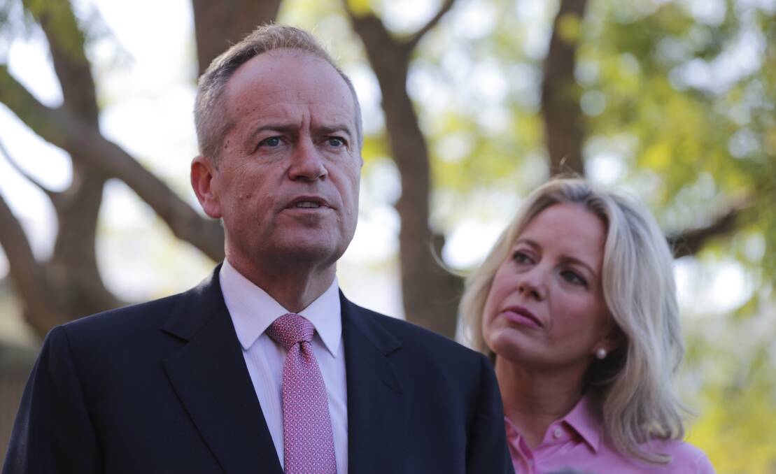 Bill Shorten, pictured with wife Chloe, conceded defeat on the night of the election. Picture: Alex Ellinghausen