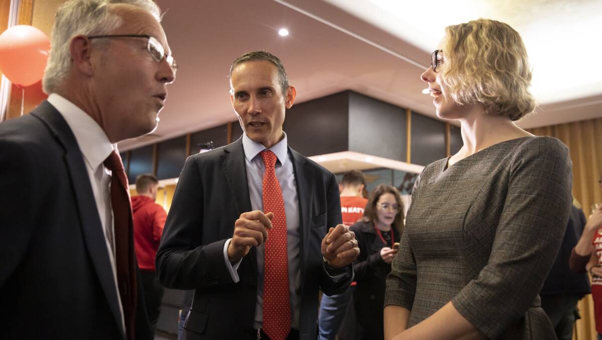 Labor's David Smith, Andrew Leigh, and Alicia Payne at the Belconnen Labor Club on Saturday night. Picture: Sitthixay Ditthavong