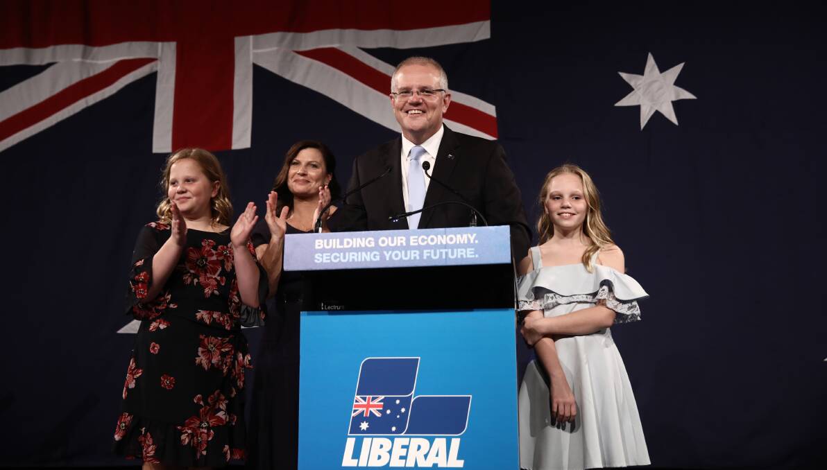 Prime Minister Scott Morrison, on stage with his family, speaks to Liberal Party supporters after his election win on May 18 this year. Picture: Dominic Lorrimer
