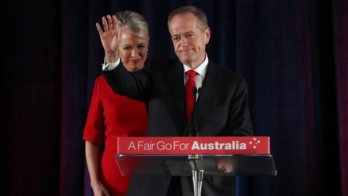 Bill Shorten concedes defeat on stage with his wife Chloe on election day. Picture: AAP