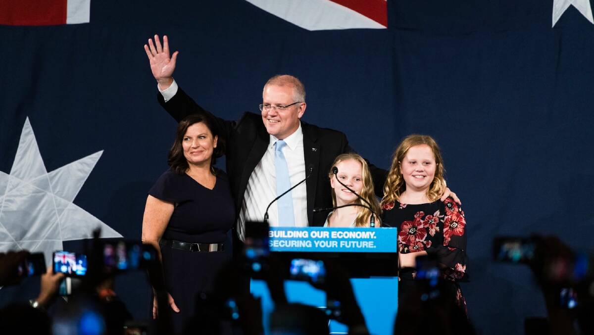 Scott Morrison celebrates his win with wife Jenny and their daughters Lily and Abbey. Picture: James Brickwood