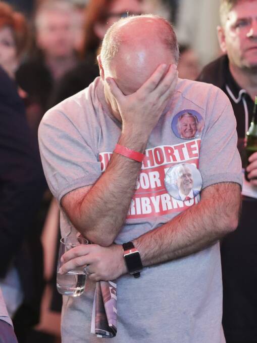 Labor supporters react to election results during Opposition Leader Bill Shorten's election night function. Picture: Alex Ellinghausen