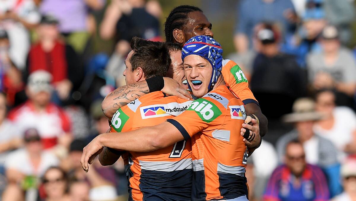 Kalyn Ponga (in headgear) destroyed the Dragons in Mudgee. Picture: AAP