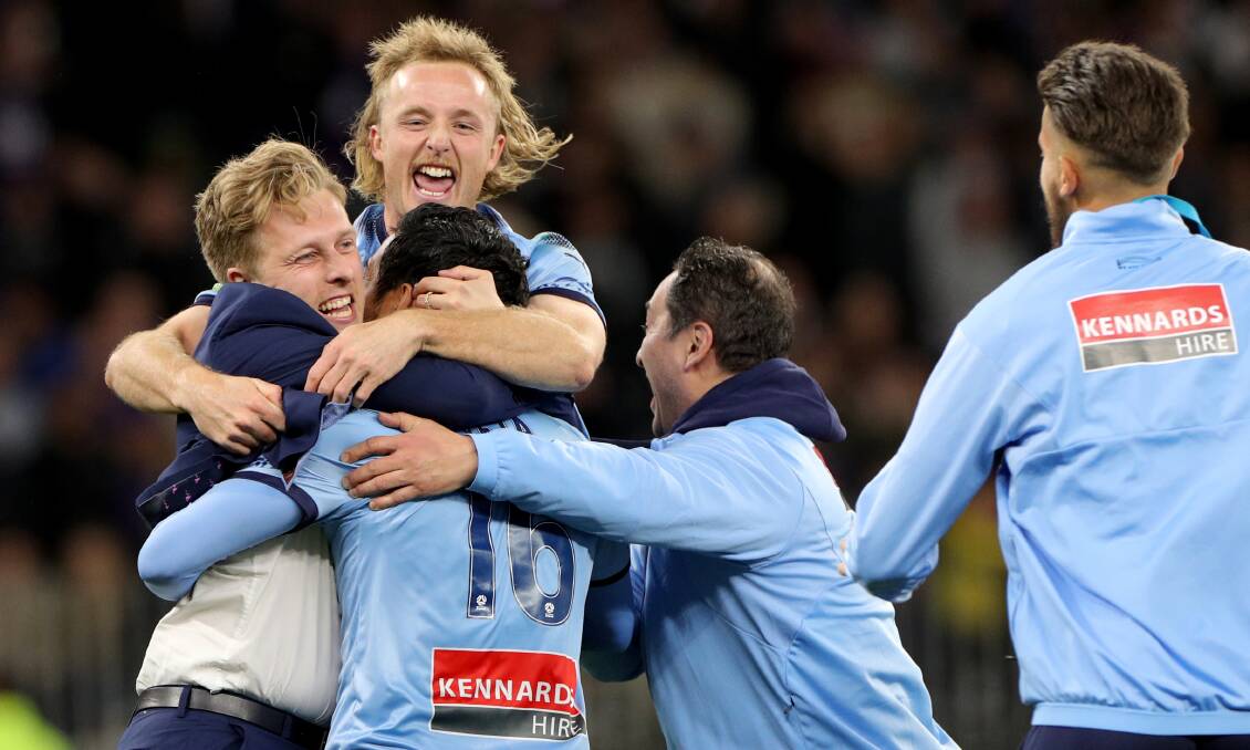 Sydney FC celebrate winning the A-League grand final. Picture: AAP