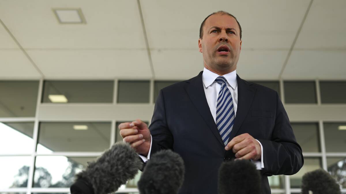 Federal Treasurer Josh Frydenberg speaks to the media in Canberra on Tuesday. Picture: AAP Image/Lukas Coch