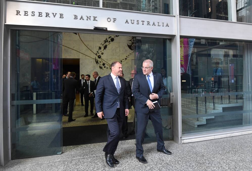 Scott Morrison (right) and Josh Frydenberg after meeting with Reserve Bank governor Philip Lowe earlier this year. Picture: Peter Rae