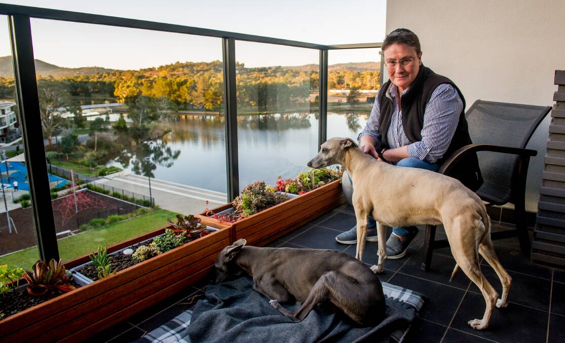 Essence apartments resident Shell Keogh, who didn't realise Lake Tuggeranong's blue-green algae stench would be so bad when she moved in November. Picture: Elesa Kurtz