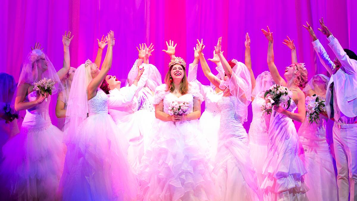 A scene from Muriel's Wedding the Musical - the showstopping number Here Comes the Bride featuring Natalie Abbott (centre) as Muriel Heslop. Picture: Jeff Busby