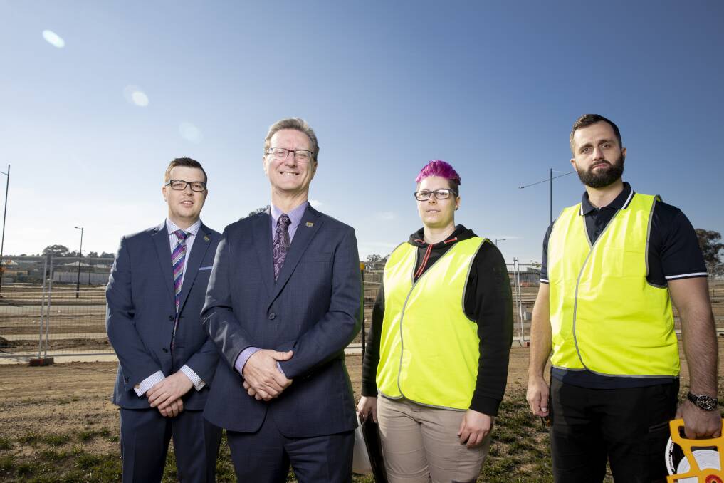 Construction occupations registrar Ben Green, Building Quality Improvement Minister Gordon Ramsay, and building inspectors Tamara Blissenden and Bojan Sekara at the Ginninderry development, which is under construction in west Belconnen. Picture: Sitthixay Ditthavong