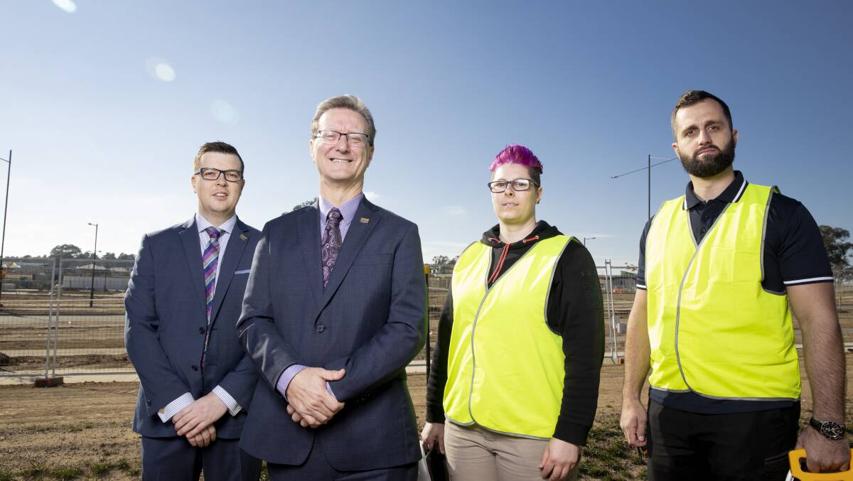 Access Canberra's Ben Green and Minister for Building Quality Improvement Gordon Ramsay with building inspectors Tamara Blissenden and Bojan Sekara. Picture: Sitthixay Ditthavong