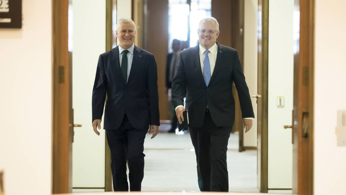 Deputy Prime Minister Michael McCormack and Prime Minister Scott Morrison arrive to speak with department secretaries around the cabinet table at Parliament House on May 23. Picture: Alex Ellinghausen