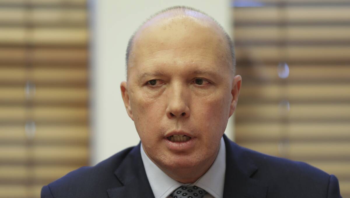 Minister for Home Affairs Peter Dutton has said previously the government would "have a look at" all options to disrupt cybercrime such as child exploitation. Picture: Alex Ellinghausen