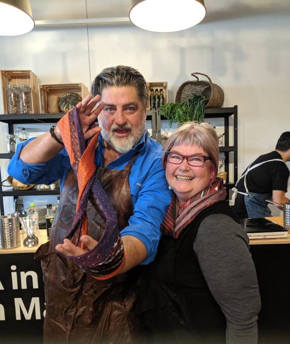 Matt Preston in Canberra on Friday with the cravat made from recycled ties made for him by local designer Bronwynne Jones. Picture: Megan Doherty