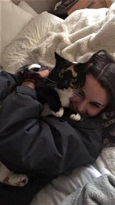 Sydnee Cooke with her cat Marley, who was killed earlier this month. Picture: Supplied