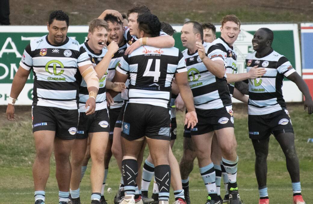 The Sharks celebrate a try in the second half. Picture: Sitthixay Ditthavong