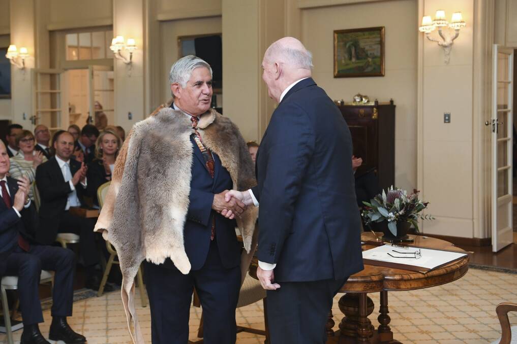 Minister for Indigenous Australians Ken Wyatt and Governor-General Sir Peter Cosgrove at Government House. Picture: AAP