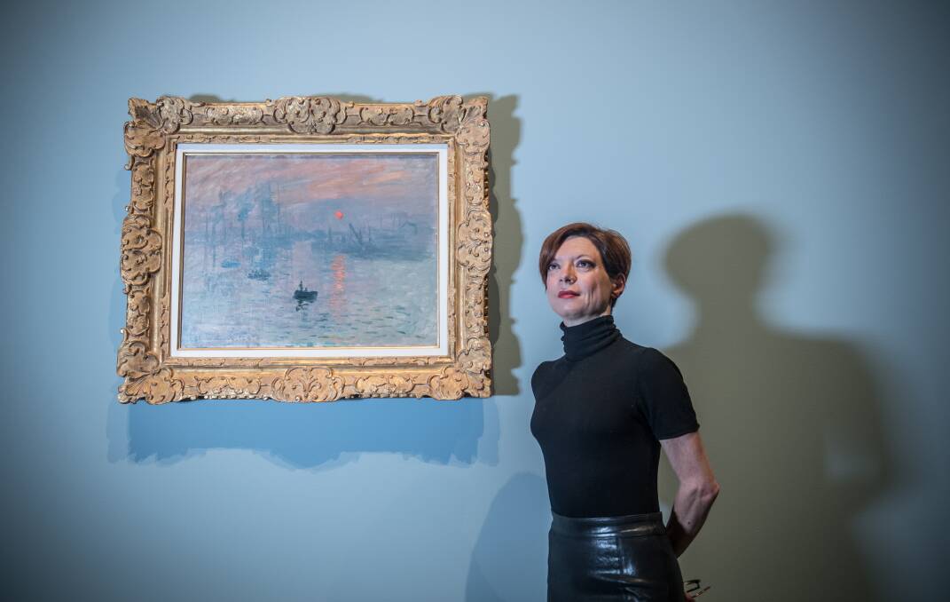 Marianne Mathieu, head curator of the Musee Marmottan in Paris, with Claude Monet's Impression Sunrise. Picture: Karleen Minney.