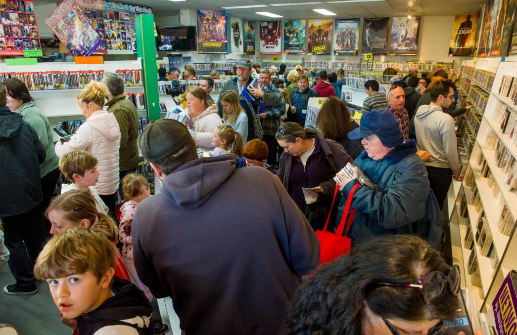 Crowds of people cram into Network Video in Charnwood for the store's closing-down sale on Saturday. Picture: Elesa Kurtz