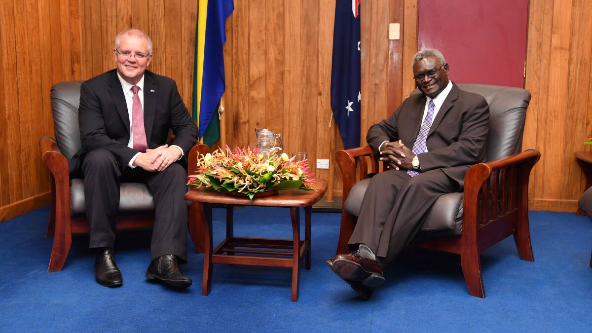 Australian Prime Minister Scott Morrison meets Solomon Islands Prime Minister Manasseh Sogavare. $250 million was announced this year in aid to the Solomon Islands. Picture: AAP