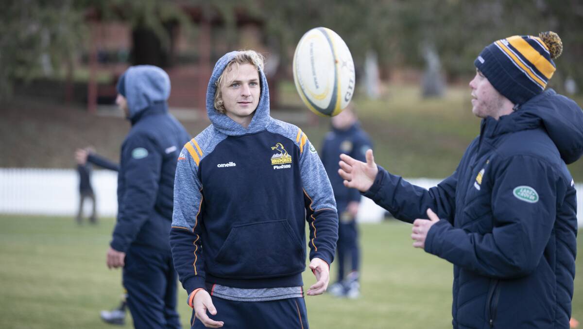 Joe Powell, left, at a Brumbies coaching clinic at Canberra Grammar on Tuesday. Picture: Sitthixay Ditthavong