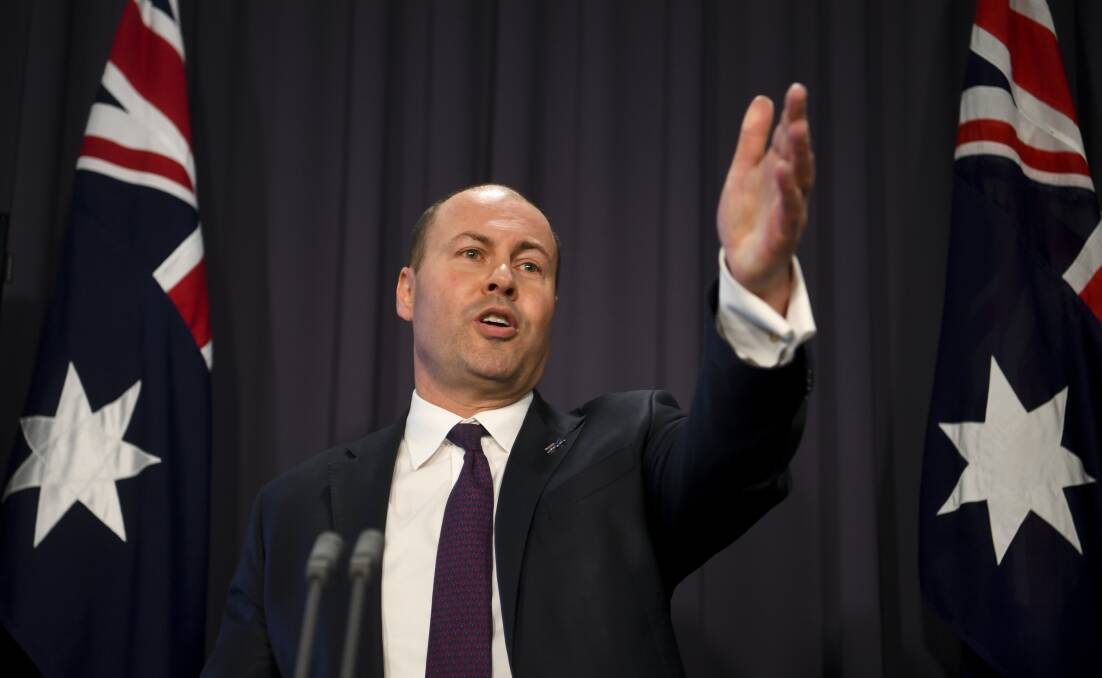 Treasurer Josh Frydenberg during a press conference at Parliament House on Wednesday. Picture: AAP Image/Lukas Coch