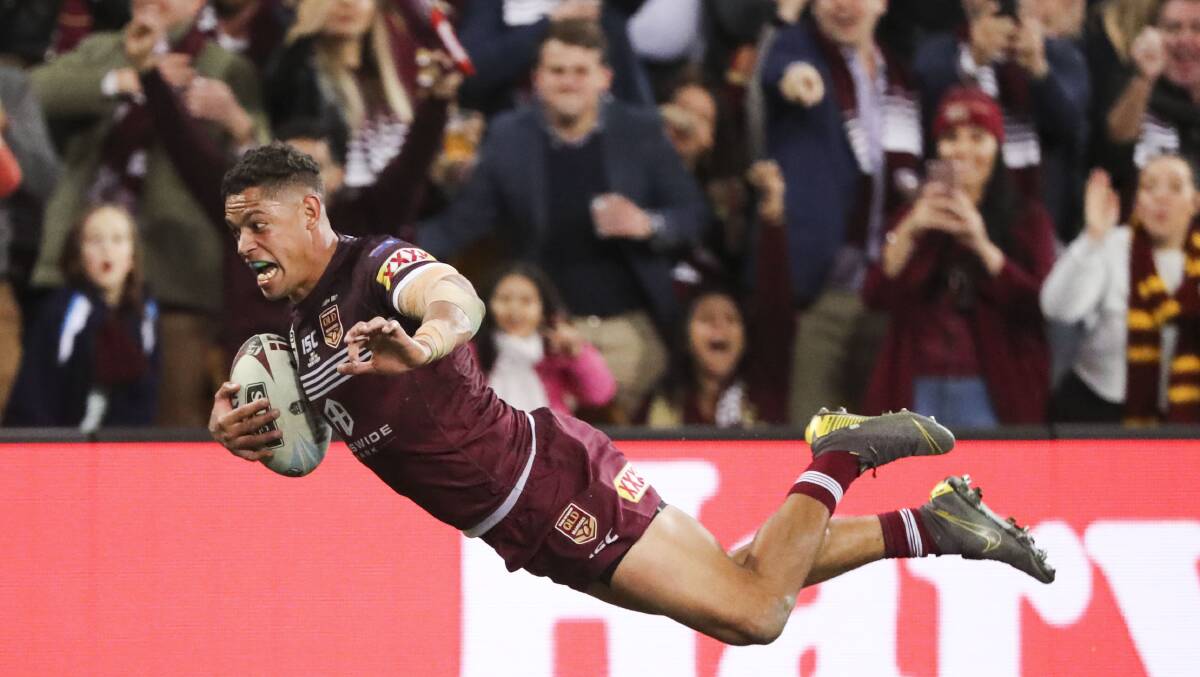 Maroons winger Dane Gagai scores his try after intercepting Jack Wighton's pass. Picture: AAP Image/Glenn Hunt